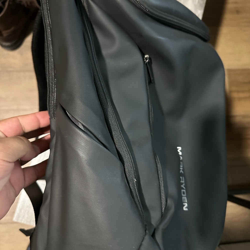 Black Backpack With Modern Design - image 2